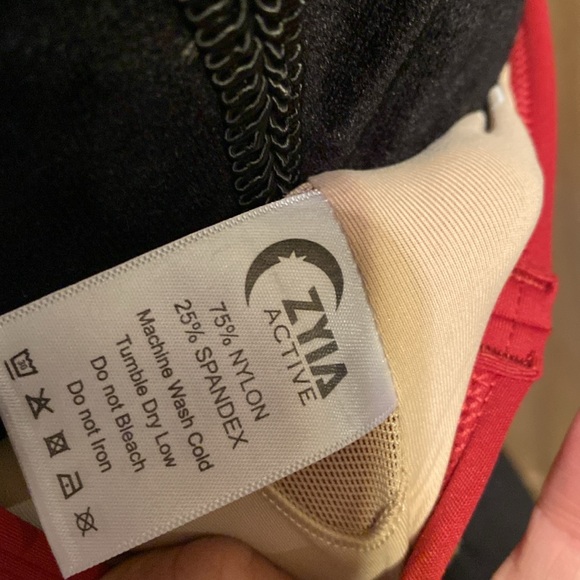 Game Day Light and Tight Sports Bra.Size Large, color is more burgundy than red. - Picture 4 of 5